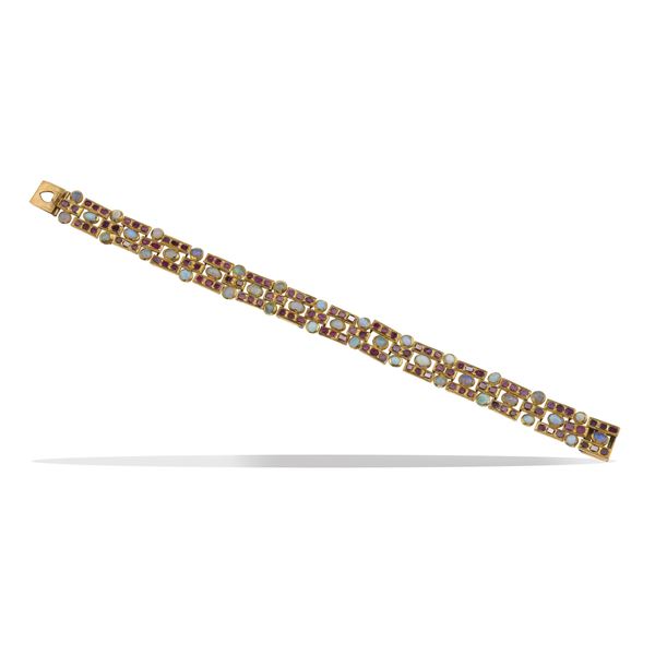 Opal, ruby, enamel and gold bracelet. Damages