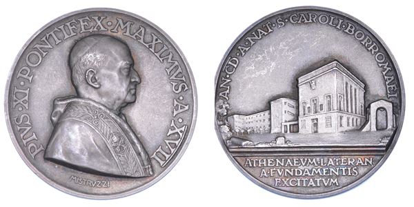 VATICANO. PIO XI (Achille Ratti), 1922-1939. Medaglia annuale in argento 1938/A. XVII. Fondazione e costruzione del nuovo Ateneo Lateranense nel IV centenario della nascita di S. Carlo Borromeo.