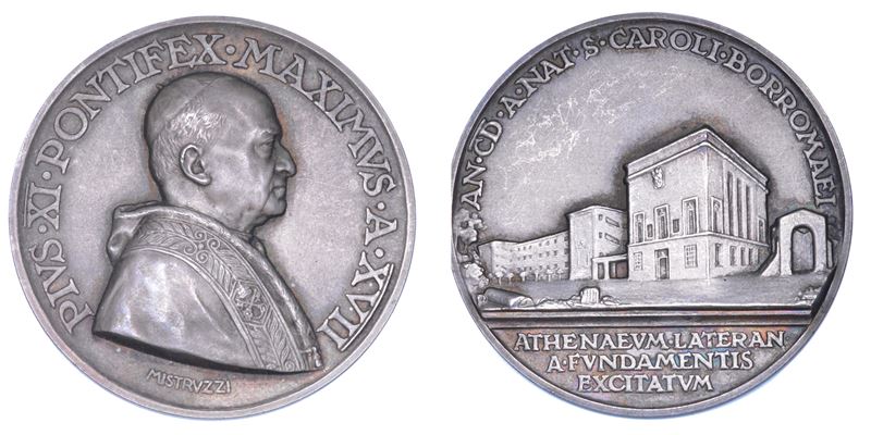 VATICANO. PIO XI (Achille Ratti), 1922-1939. Medaglia annuale in argento 1938/A. XVII. Fondazione e costruzione del nuovo Ateneo Lateranense nel IV centenario della nascita di S. Carlo Borromeo.  - Auction Numismatics - Medals and popes - II - Cambi Casa d'Aste