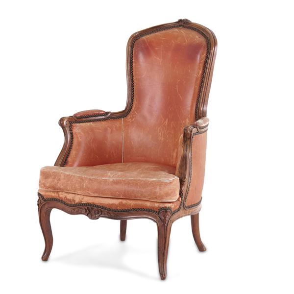 Poltrona in legno intagliato