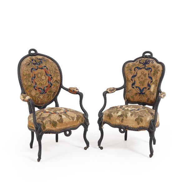 Due poltrone in legno ebanizzato ed intagliato a torciglione, XVIII secolo