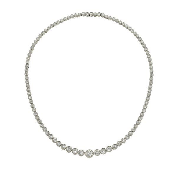 Old-cut diamond weighing approximately 13.00 carats and platinum line necklace