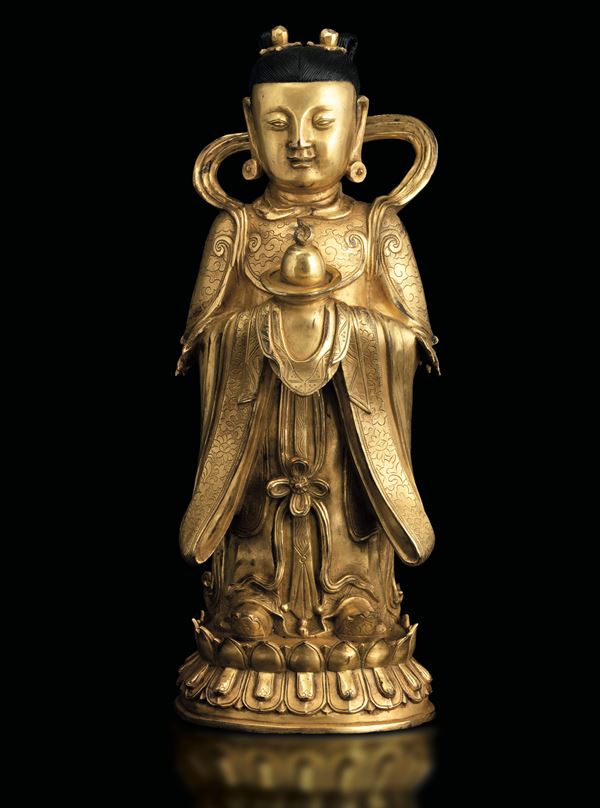 Figura di Guanyin scolpita in bronzo su doppio fiore di loto, doratura postuma, Cina, Dinastia Ming  [..]