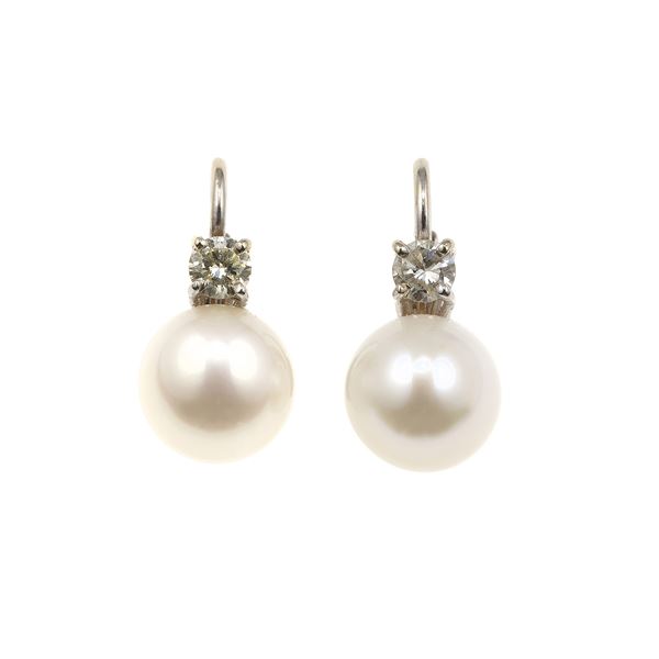 Pair of cultured pearl and diamond earrings