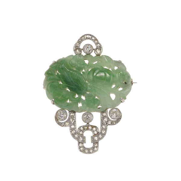Carved jadeite and diamond and gold brooch