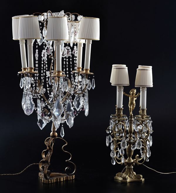 Una coppia di girandoles e una più piccola in metallo dorato. XX secolo