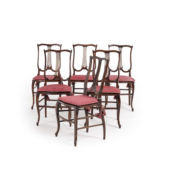 Gruppo di sei poltrone in legno di gusto settecentesco. Inghilterra, XIX-XX secolo