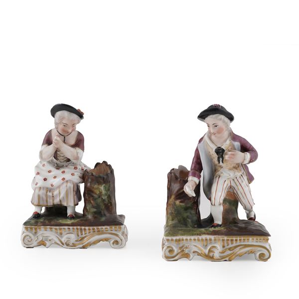 Due figurine portafiori, XIX secolo.