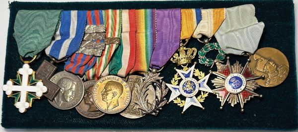 VARIE. Parure con dieci onorificenze.