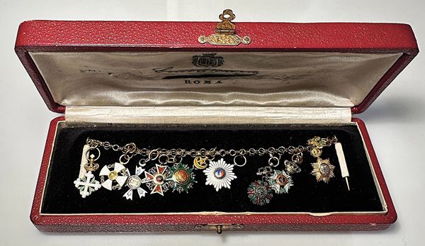 VARIE. Mini parure con nove miniature.