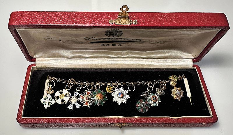 VARIE. Mini parure con nove miniature.  - Auction Numismatics - Medals and popes - II - Cambi Casa d'Aste