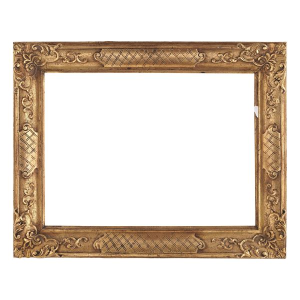 Cornice in legno intagliato e dorato. XIX-XX secolo