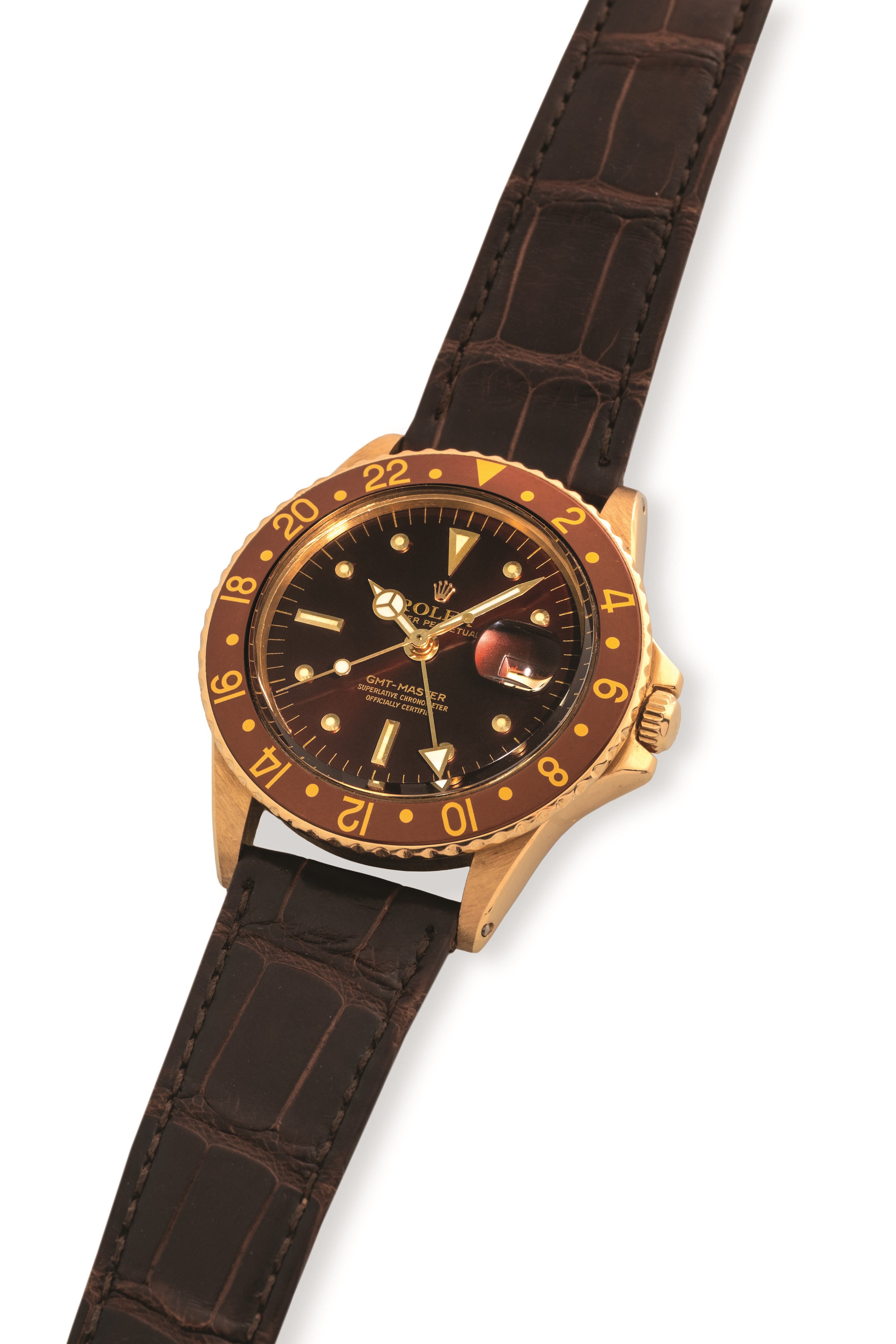 Rolex - GMT Master ref. 1675 in oro giallo 18k, quadrante marrone soleil 'Nipple', circa 1977