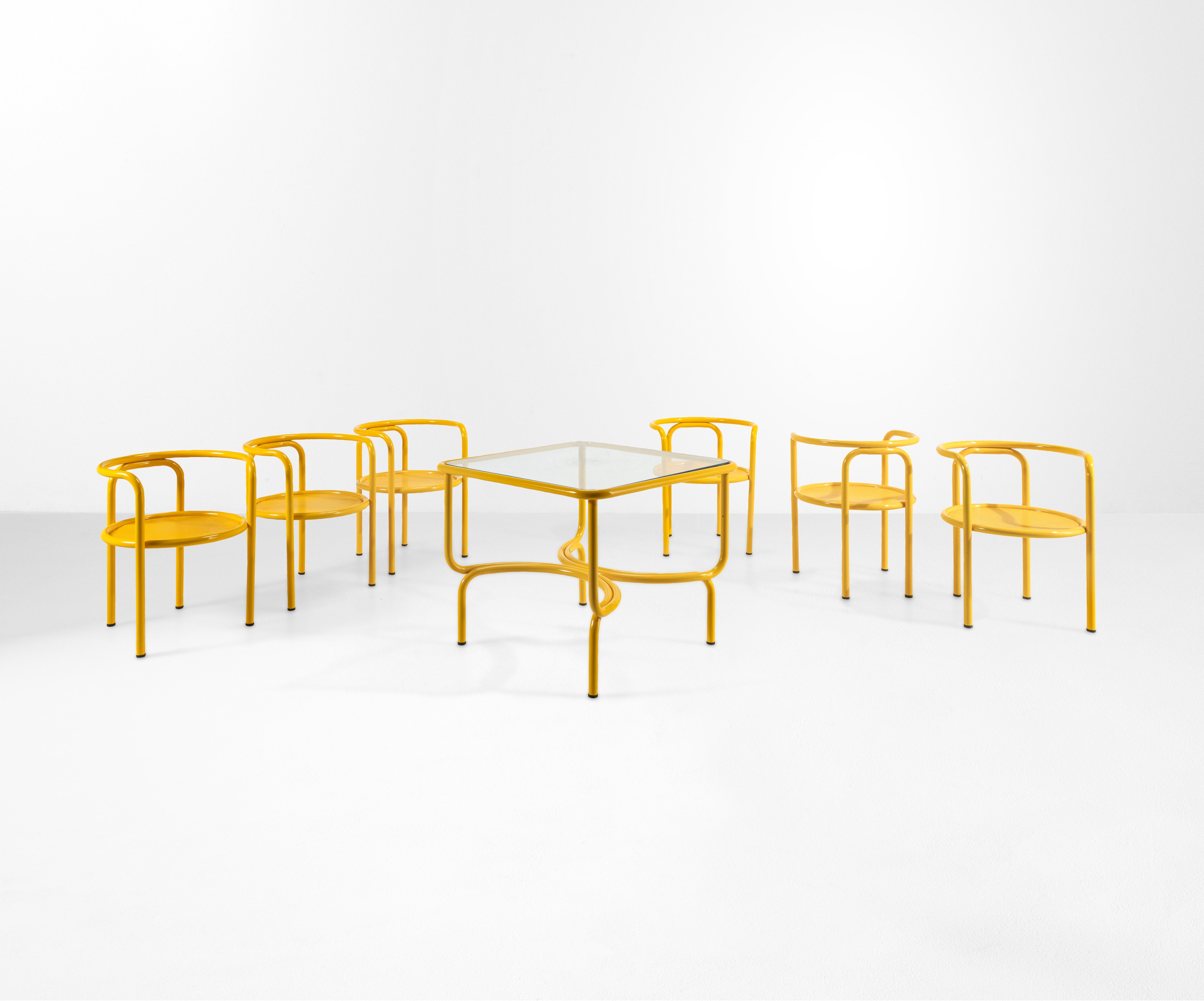 Gae Aulenti - Un Tavolo e Sei Sedie della Serie Locus Solus.