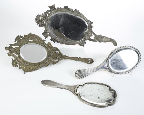 Lotto di due specchi in argento e due in metallo. Manifattura italiana del XX secolo