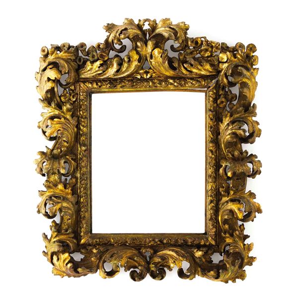 Cornice in legno intagliato e dorato. Italia XVIII-XIX secolo