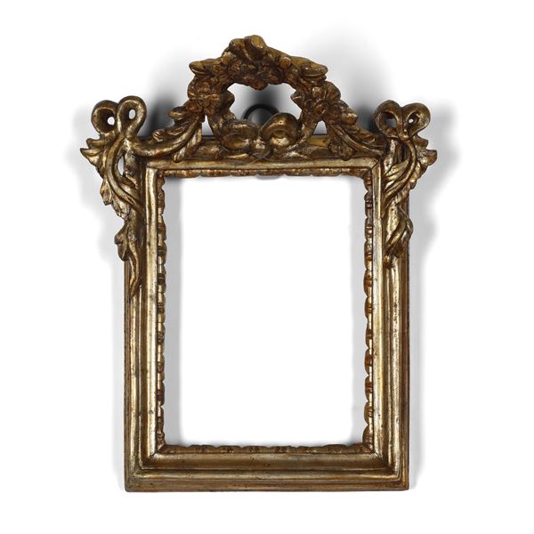 Cornice in legno intagliato e dorato. XVIII secolo