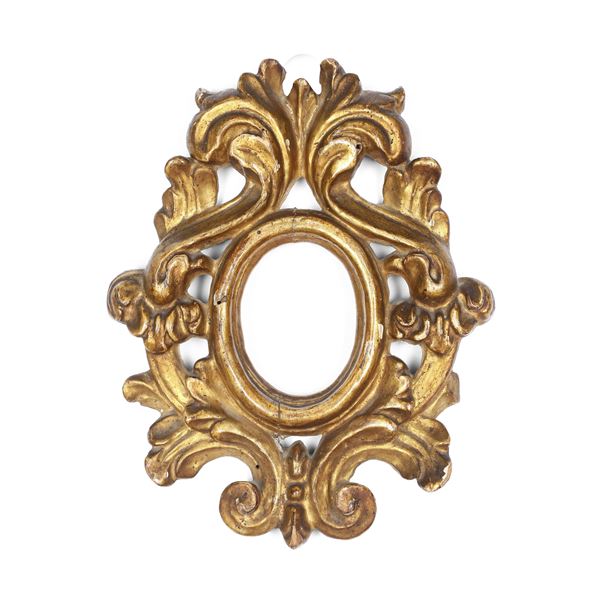 Cornice in legno intagliato e dorato. Emilia XVIII secolo