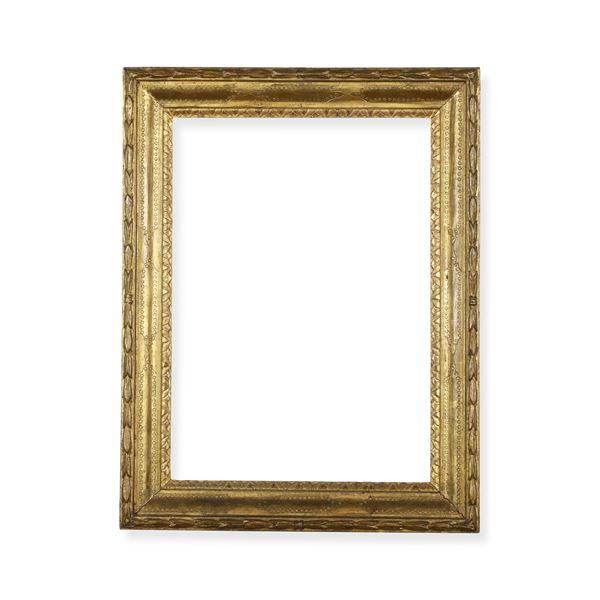 Cornice in legno intagliato e dorato. XIX secolo