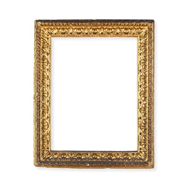 Cornice in legno intagliato e dorato. Emilia XVIII secolo