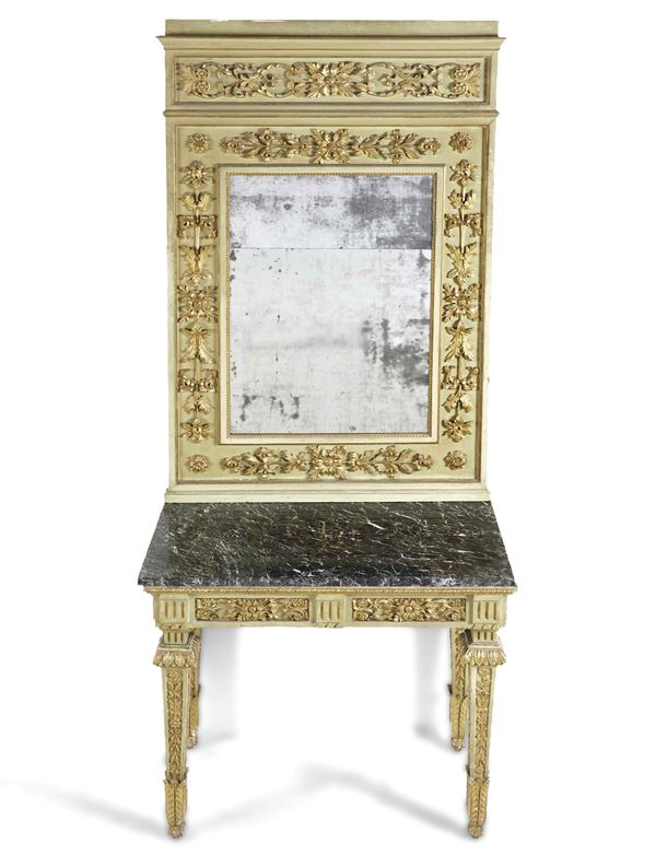 Consolle con specchiera in legno intagliato.