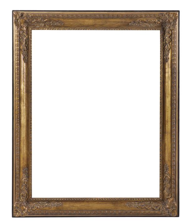 Cornice dorata in stile. XX secolo