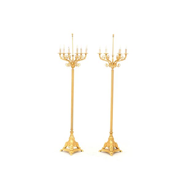 Coppia di torcere in bronzo dorato