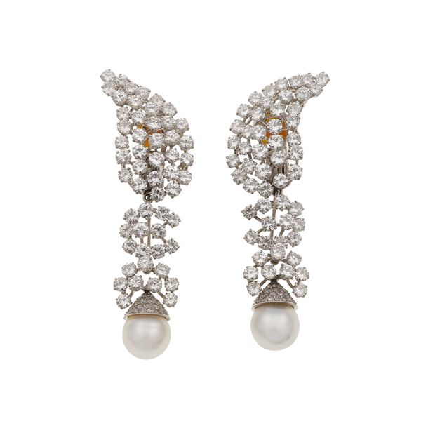 Pair of brilliant-cut diamond weighing approximately 16.00 carats and cultured pearl earrings. Pendants detachable