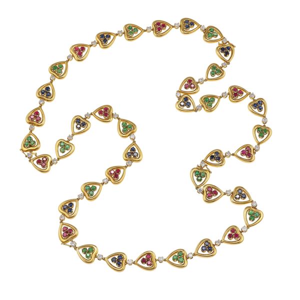 Diamond, emerald, ruby, sapphire and gold long necklace. The necklace can be separated into four bracelets