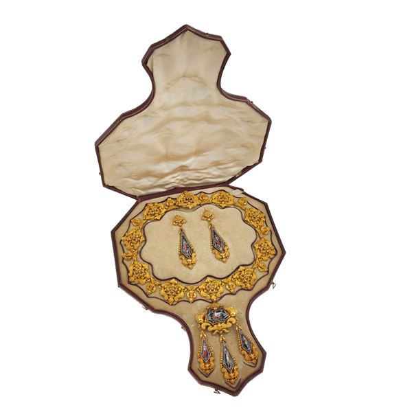 Miniature and gold demi-parure. Fitted case