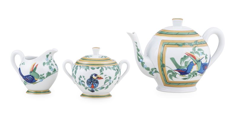 Teiera, lattiera e zuccheriera Hermès "Tucano". Francia, Manifattura di Limoges, fine XX - inizio XXI secolo.  - Auction Italian Residences - Cambi Casa d'Aste