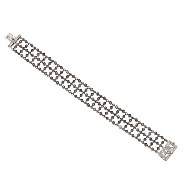 Diamond, sapphire, gold and silver bracelet