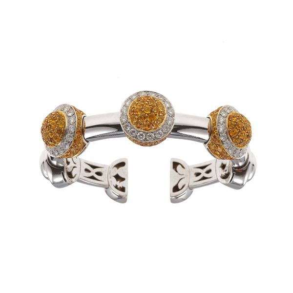 Diamond and yellow sapphire bangle. Signed Chantecler