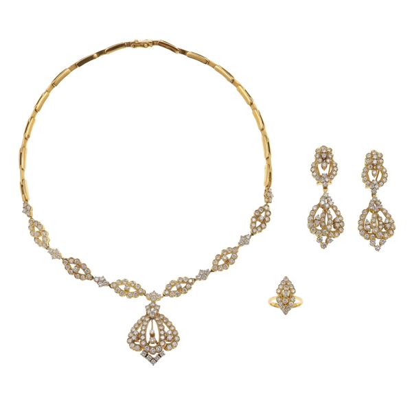 Parure composta da girocollo, orecchini ed anello con diamanti taglio brillante