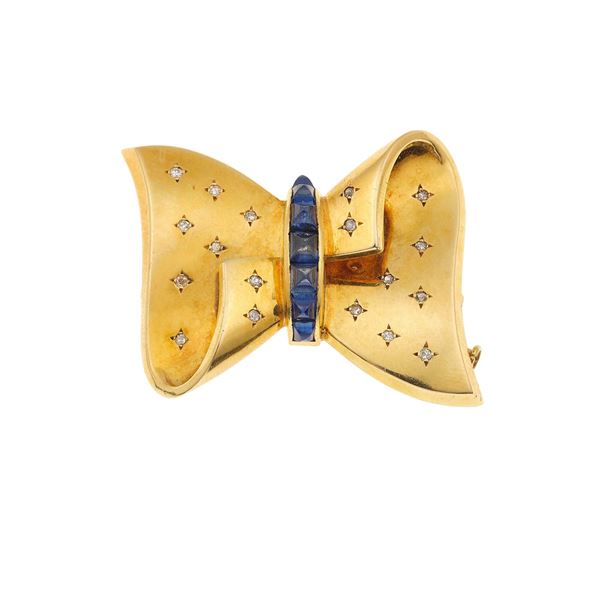 Gold, sapphire and diamond "bow" brooch. Signed Tiffany & Co.