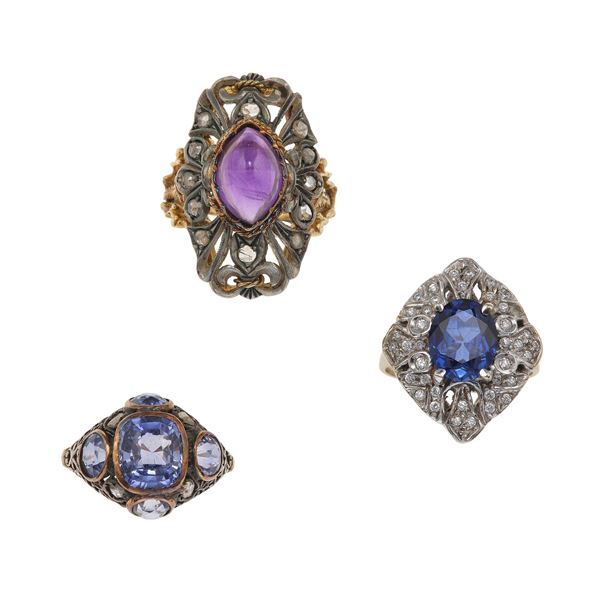 Three synthetic gemstone, amethyst, gold and silver rings