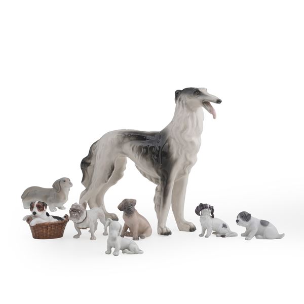 Otto figurine di cani, XX secolo.  