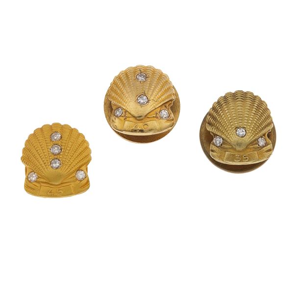Three gold, metal and little diamond lapel pins. Signed Pisano, Genova