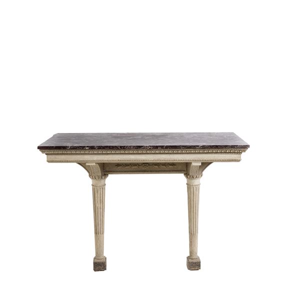 Consolle in legno intagliato e dipinto. XIX secolo