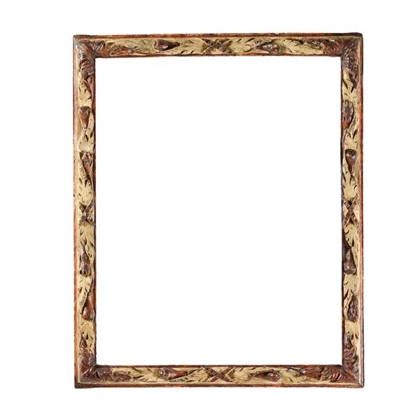 Cornice intagliata laccata e dorata. XVIII secolo