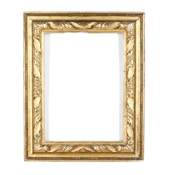 Cornice in legno intagliato e dorato. XIX secolo