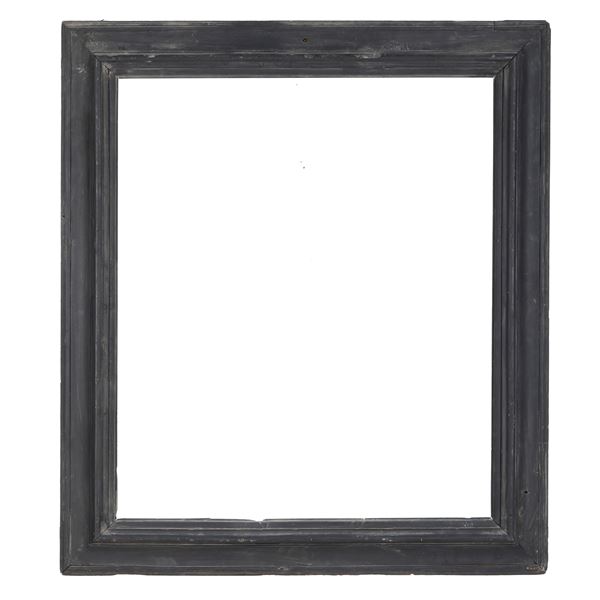 Cornice in legno ebanizzato. Italia centrale XVII secolo