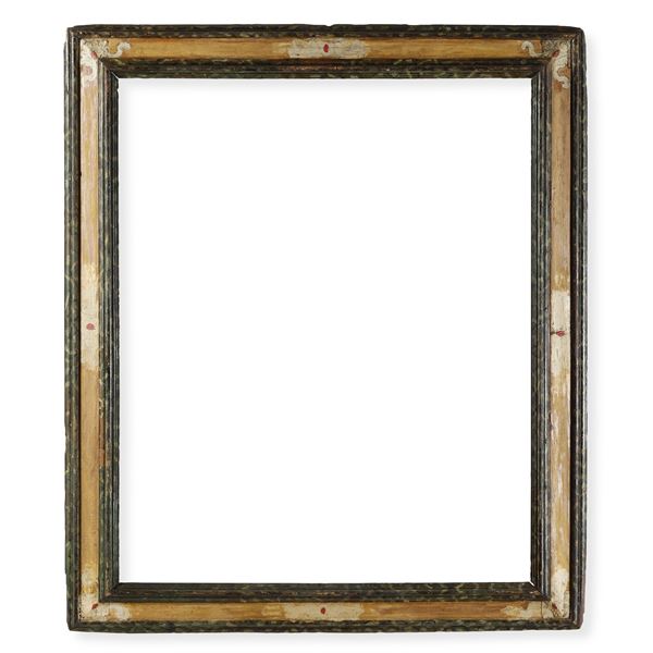 Cornice in legno intagliato e dipinto. Marche XVII secolo