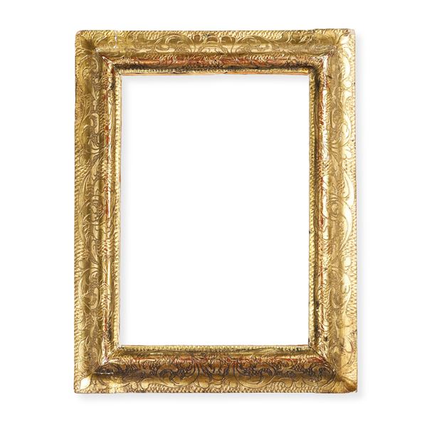 Cornice in legno dorato e inciso. Marche XVIII secolo