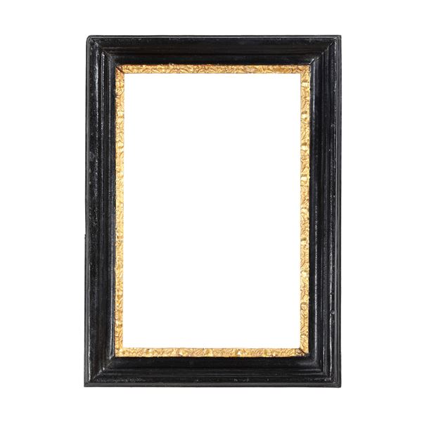 Cornice intagliata dorata ed ebanizzata. Roma XVIII secolo