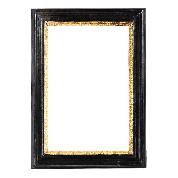 Cornice intagliata dorata ed ebanizzata. Roma XVIII secolo