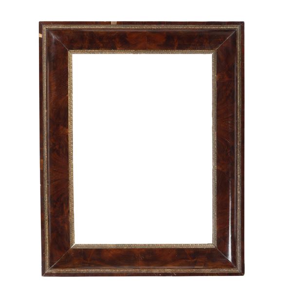 Cornice a gola in mogano e oro. XIX secolo