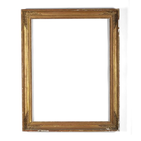 Cornice neoclassica dorata. XIX secolo