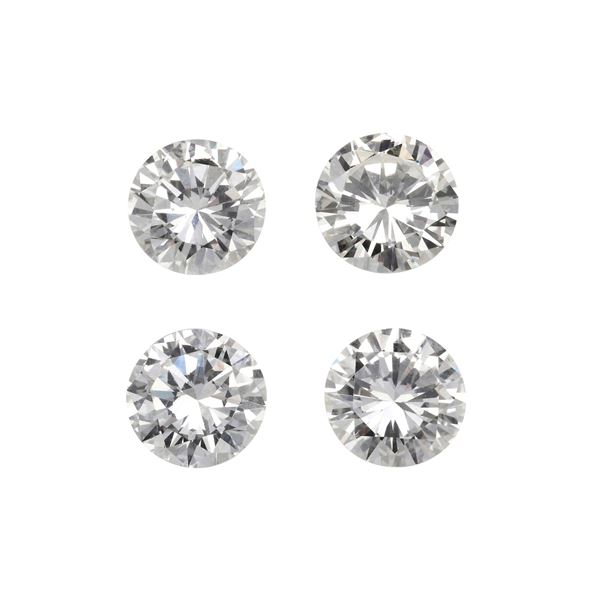 Four brilliant-cut diamonds weighings 0.70, 0.71, 0.71 and 0.74 carats