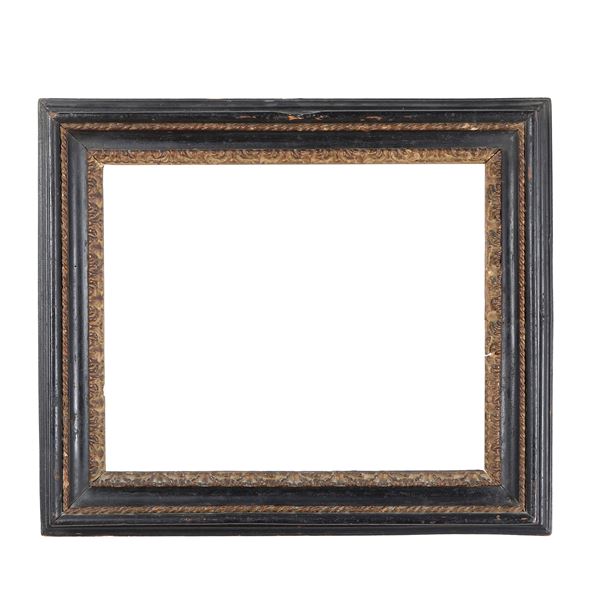 Cornice in legno ebanizzato e dorato. Roma fine XVIII secolo